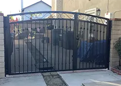 Double Gate with Screen, Knuckles, and Scrolls Ontario CA