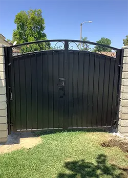 Black Iron Gate With Sheet Metal & Scrolls Chino CA