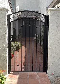 Black Pedestrian Gate with Arch, Scrolls, Knuckles, & Screen La Mirada CA