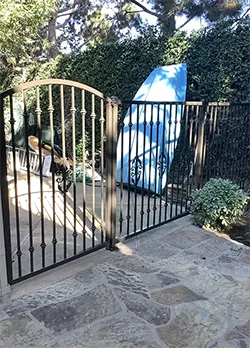 Bronze Iron Gate with Knuckles and Decorative Middle Piece Huntington Beach CA
