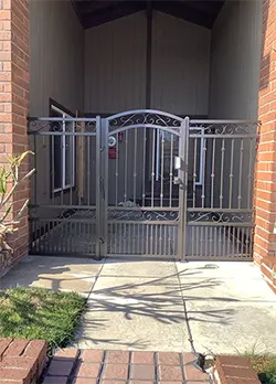 Couryard Gate with Double Scrolls, Double Picket, and Knuckles Fountain Valley CA
