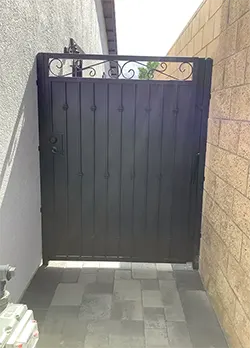 Wrought Iron Pedestrian Gate with Scrolls, Knuckles, and Knucles Fontana CA